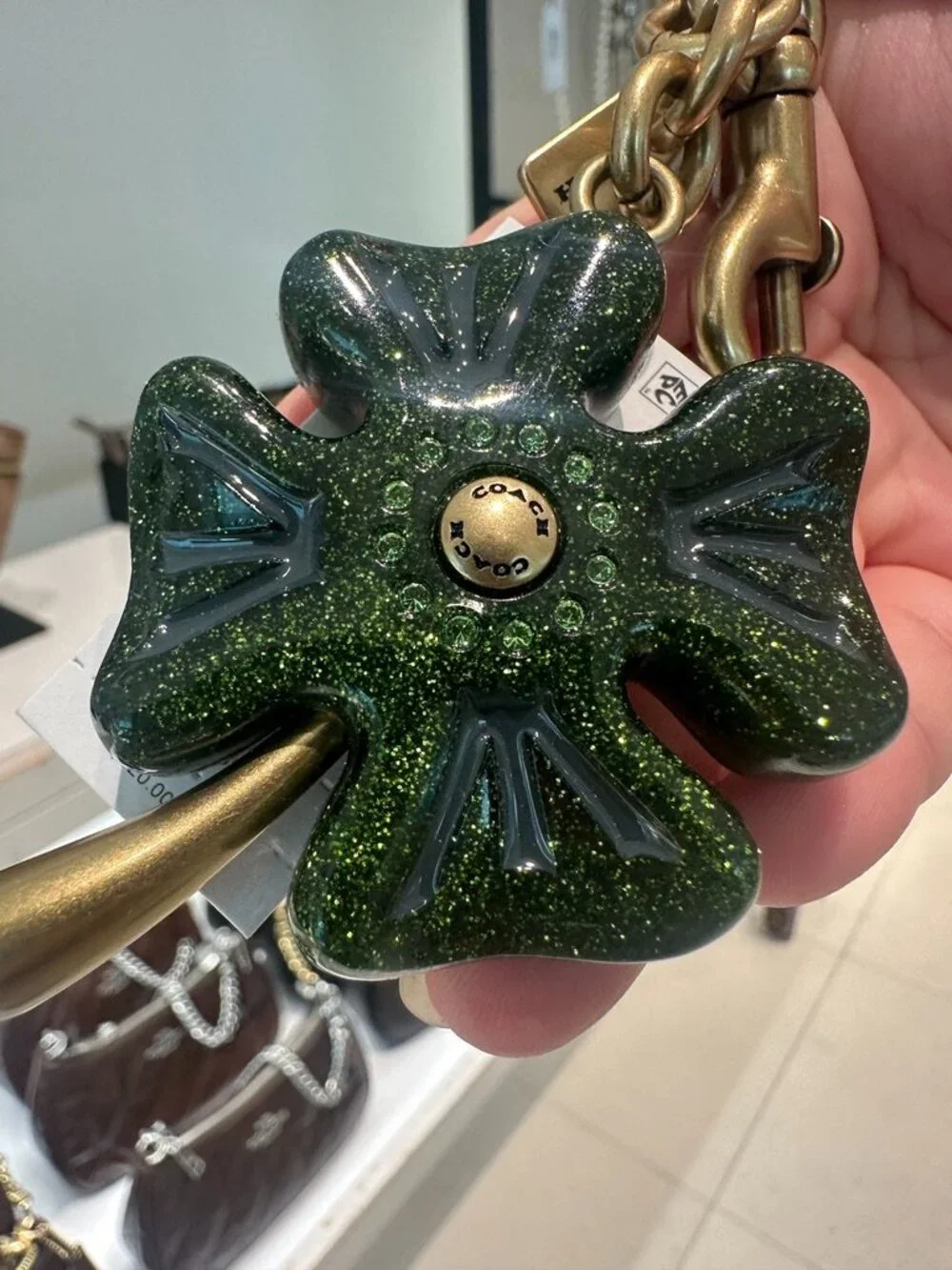 NWT! Coach CEA09 Four Leaf Clover Bag Charm In Brass/Green Multi With Dust Bag